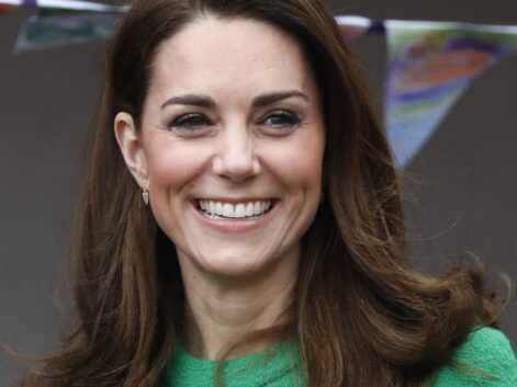 PHOTOS - Kate Middleton fait sensation dans une robe verte flashy et une paire de boots montantes