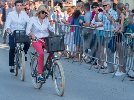 Look - Brigitte Macron sportive en vélo et sneakers Louis Vuitton