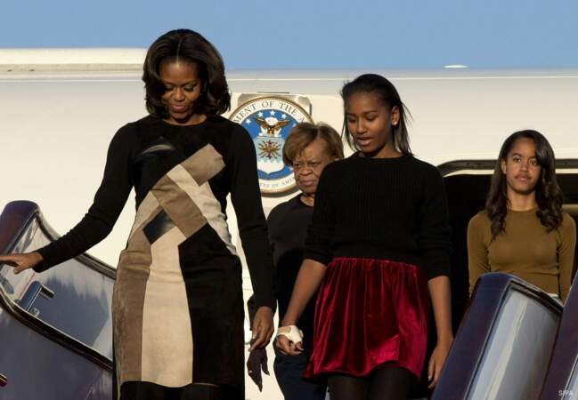 Michelle, à son arrivée en Chine, accompagnée de ses filles Sasha et Malia