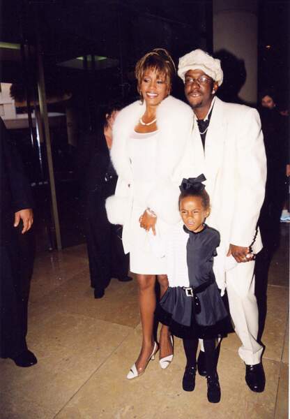 Bobby Brown et Whitney Houston ont toujours joué le jeu devant les photographes, même avec leur fille fatiguée