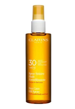 Clarins, Spray solaire huile embellissante corps et cheveux SPF30, 27,50€