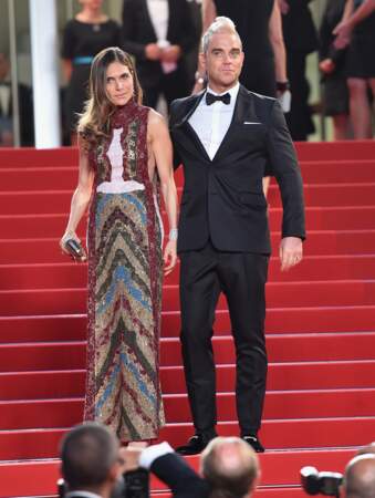 Robbie Williams et son épouse Ayda Field avec des créations Giuseppe Zanotti Design. Elle porte des bijoux Chopard
