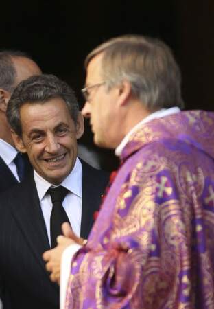 Nicolas Sarkozy tout sourire