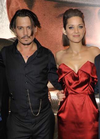 Marion Cotillard et Johnny Depp pour la présentation de Public Enemies