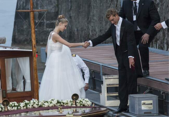 Giorgio Armani avait aussi dessiné la robe blanche que la mariée portait pour la fête