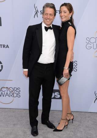 Hugh Grant et sa femme Anna Elisabet Eberstein ont pris la pose au photocall des SAG Awards 2019.