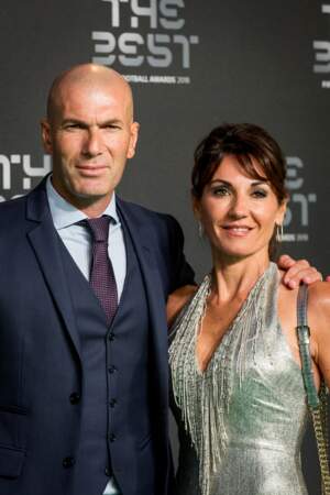 Zinedine Zidane, souriant en compagnie de son épouse, Véronique lors de la soirée des trophées FIFA 2018