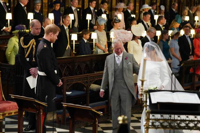 Le prince Harry, le prince Charles et Meghan Markle durant le mariage