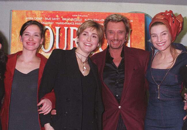 Julie Gayet et Johnny Hallyday en 1999 lors de la première de "Pourquoi pas moi?"