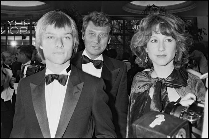 David et Johnny Hallyday avec Nathalie Baye lors de la soirées des "Best" à Paris en 1983