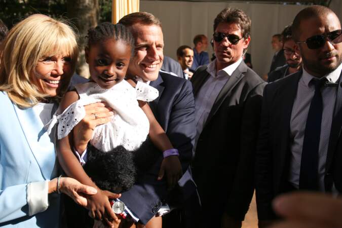 Emmanuel et Brigitte Macron lors des portes ouvertes au palais de l'Elysée