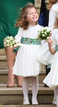 La princesse Charlotte faisant la grimace fièrement au mariage d'Eugenie d'York en octobre 2018
