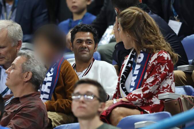 Jamel Debbouze n'a d'yeux que pour sa femme, Mélissa Theuriau lors du match France-Allemagne ce 16 octobre