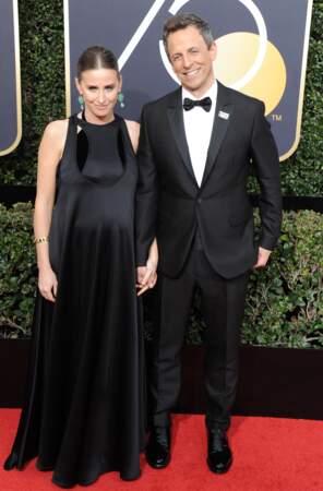 Seth Meyers et sa femme Alexi Ashe qui affiche sa grossesse dans une robe longue noire et en satin ultra chic