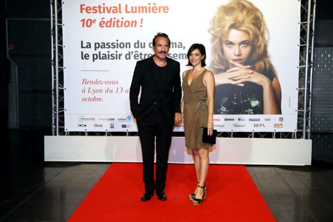 Jean Dujardin et Nathalie Péchalat, à l'ouverture du 10e Festival Lumière, à Lyon, le 13 octobre 2018
