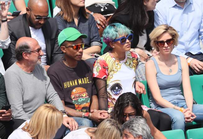 Pharrell Williams et sa femme très concentrés