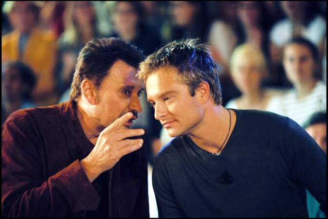 Johnny et David Hallyday sur le plateau de l'émission "Nulle Part Ailleurs" en 1999