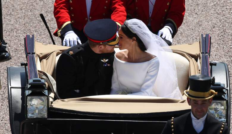 Le prince Harry et Meghan Markle en calèche à la sortie du château de Windsor, après leur mariage, le 19 mai 2018.