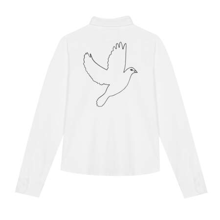 Liberté, chemise blanche brodée d'une colombe, 150 € (Agnes b. x Jain).