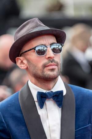 JR (en Gucci) lors de la projection du film "Les Misérables" à Cannes le 15 mai 2019