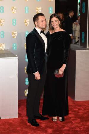 Taron Egerton et sa compagne Emily Thomas sur le tapis rouge des BAFTA, le 10 février 2019 à Londres