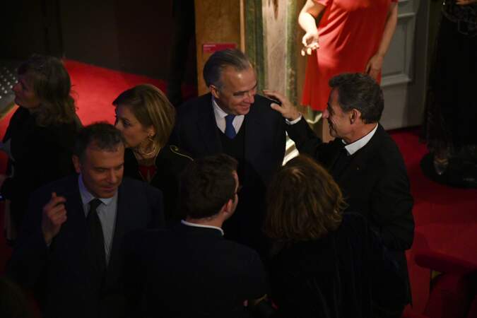 Carla Bruni, célébrant l'entrée de sa statue de cire au Musée Grévin, avec Nicolas Sarkozy, le 17 décembre 2018