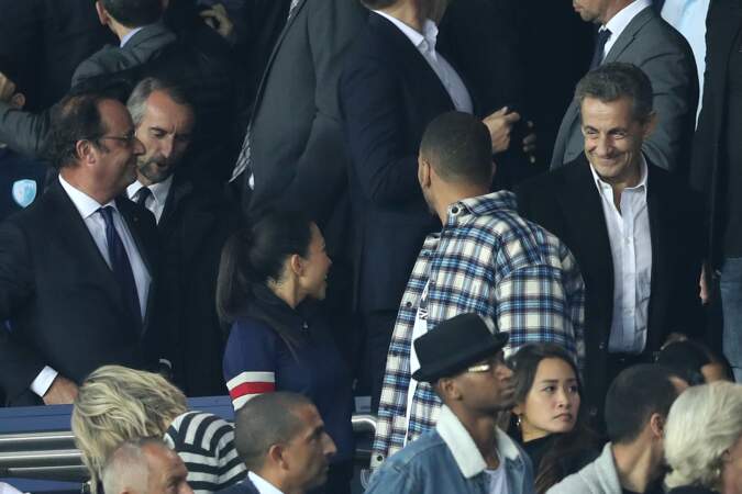 François Hollande et Nicolas Sarkozy avec Kourtney Kardashian devant eux