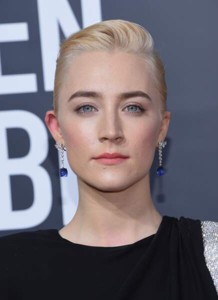 Saoirse Ronan avait, elle, relevé sa chevelure blonde platine en un discret chignon bas 