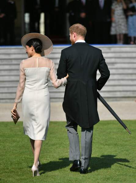 Le prince Harry, duc de Sussex, et Meghan Markle, duchesse de Sussex, lors de la garden party à Buckingham Palace
