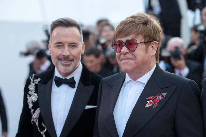 Elton John et son mari David Furnish lors de la montée des marches de "Rocketman" le 16 mai 2019