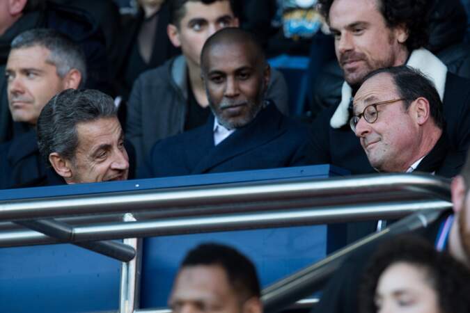 Nicolas Sarkozy et François Hollande dans les tribunes du Parc des Princes à l'occasion du match Psg/ Nimes