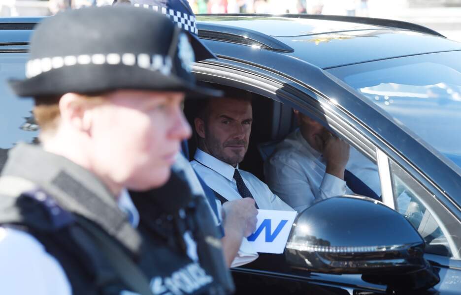 David Beckham arrive au palais de Buckingham palace à Londres