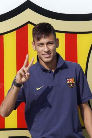 Le joueur en juin 2013 en tant que nouvel attaquant du FC Barcelone.