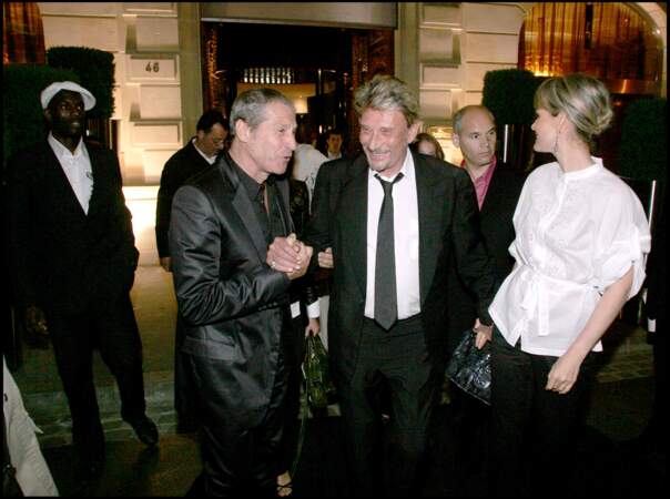 Jean-Claude Darmon, Johnny et Laeticia Hallyday lors d'une soirée au Fouquet's à Paris en 2007