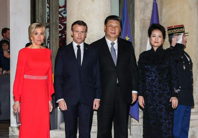 Emmanuel et Brigitte Macron reçoivent le couple présidentiel chinois à l'Elysée, le 25 mars 2019