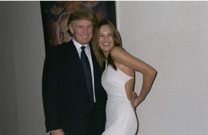 Melania et Donald Trump à la première du film "Star Wars Episode I : La Menace fantôme" le 16 mai 1999 à New York. Elle portait alors une robe blanche dos-nu.