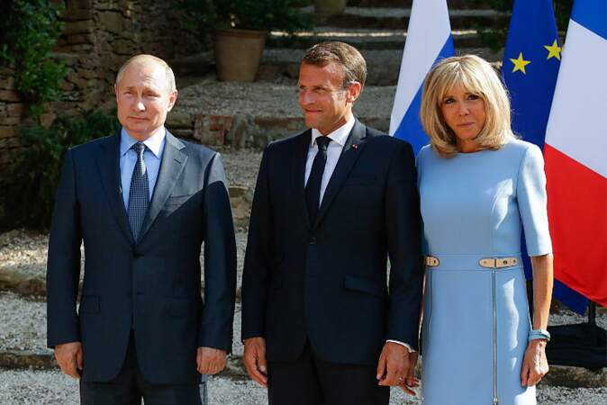 Le président Vladimir Poutine, le président Emmanuel Macron, la première dame Brigitte Macron