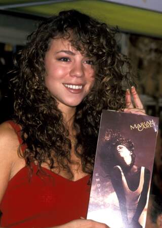 1991, sourcils épais et tignasse folle ce n'est pas encore la Mariah que l'on connaît