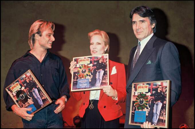 David Hallyday, Sylvie Vartan et Tony Scotti lors d'une soirée au Palace à Paris en 1989