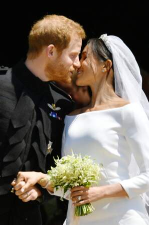 Meghan Markle et le prince Harry lors de la sortie après la cérémonie de mariage, le 19 mai 2018.