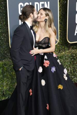 Heidi Klum (en robe Monique Lhuillier) et son fiancé Tom Kaulitz lors des Golden Globes, le 6 janvier 2019