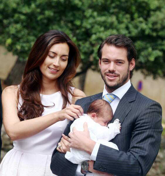 Félix du Luxembourg, son épouse Claire et leur fille la princesse Amalia lors son baptême le 12 juillet 2014