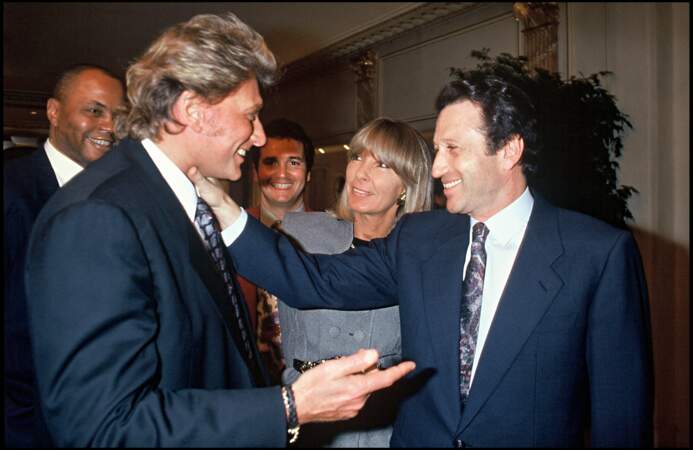 Johnny Hallyday, Dany Saval et Michel Drucker à l'anniversaire de Jean-Paul Belmondo en 1993