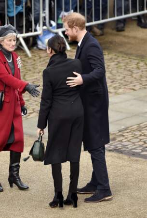Le prince Harry et Meghan Markle en noir tous les deux