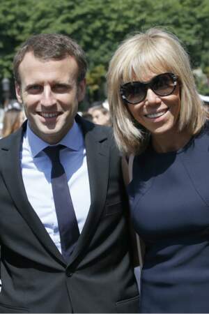 Le ministre de l'économie, de l'industrie et du numérique Emmanuel Macron et sa femme Brigitte, le 14 juillet 2016 