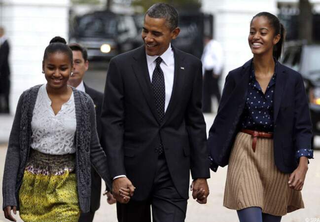 Barack, entouré de ses filles, en route pour l'Eglise épiscopale St John à Washington, dimanche 28 octobre 2012