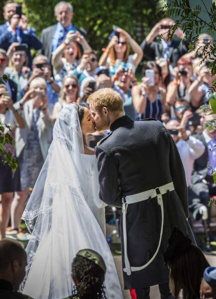 Le prince Harry et Meghan Markle (en Givenchy) lors de leur mariage à Windsor le 19 mai 2018