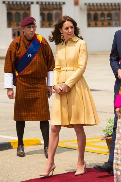 Princesse Kate radieuse dans sa robe jaune d'or, symbole de la couleur de la dynastie régnante du Bhoutan