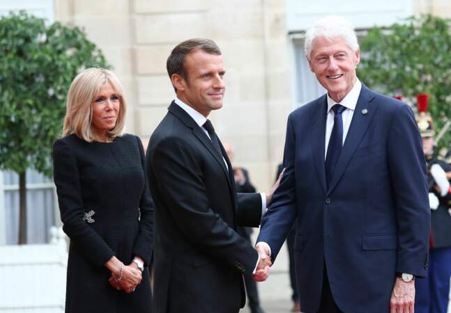 Bill Clinton et les Macron aux obsèques de Jacques Chirac, en l'église Saint-Sulpice, à Paris, le 30.09.2019