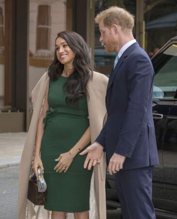 Meghan Markle a porté cette robe verte signée Parosh lors d'une sortie avec son époux, le 15 octobre 2019.